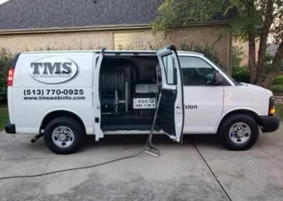 a work van with the side doors open